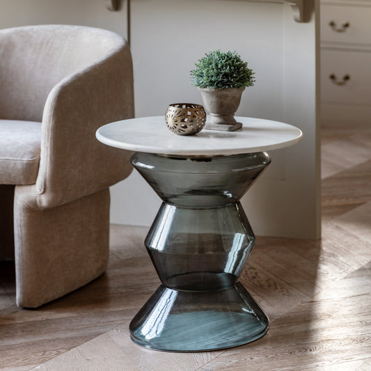 Gallery Direct Turin Side Table in Smoke Grey with a round white marble table top and sculptural clear glass base