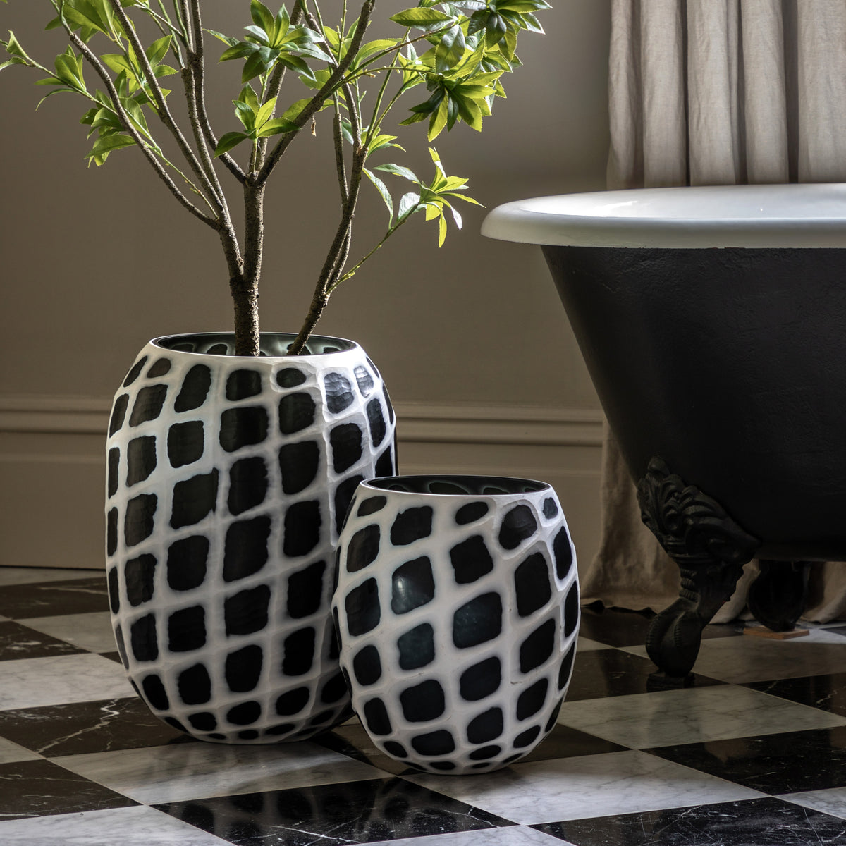 Gallery Direct Valencia Handblown Carved Mono Glass Vase Black and White Small, styled in a supplier lifestyle setting