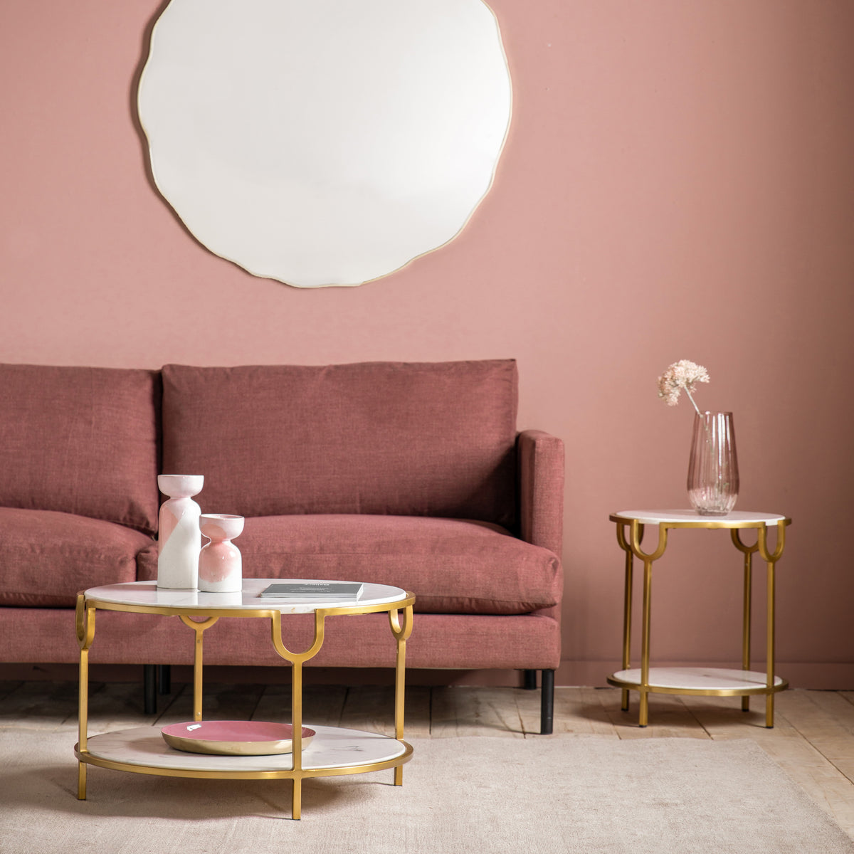 Gallery Direct Weston Side Table White Marble in a pink living room beside a sofa