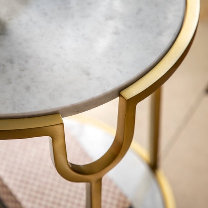 Close-up of white marble top and brushed brass frame on the Gallery Direct Weston Side Table