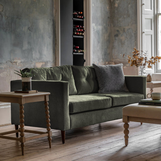 Gallery Direct Whitwell 3 Seater Sofa Upholstered in a Forest Green coloured fabric with button tufted back cushions and tapered wooden legs
