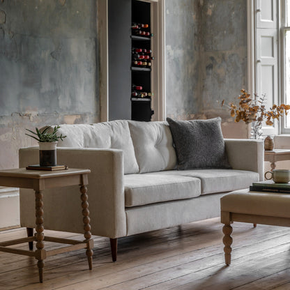 Gallery Direct Whitwell 3 Seater Sofa Upholstered in a Light Grey Fabric with distinctive block arms and button tufted back cushions