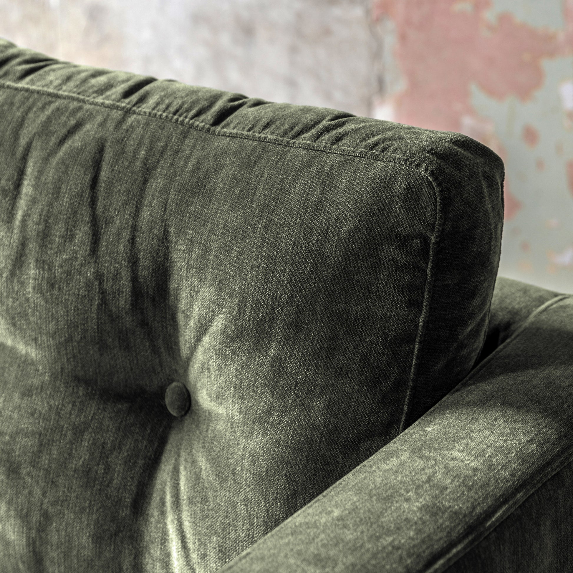 Gallery Direct Whitwell Sofa upholstered in a Forest green fabric with button tufted back cushions