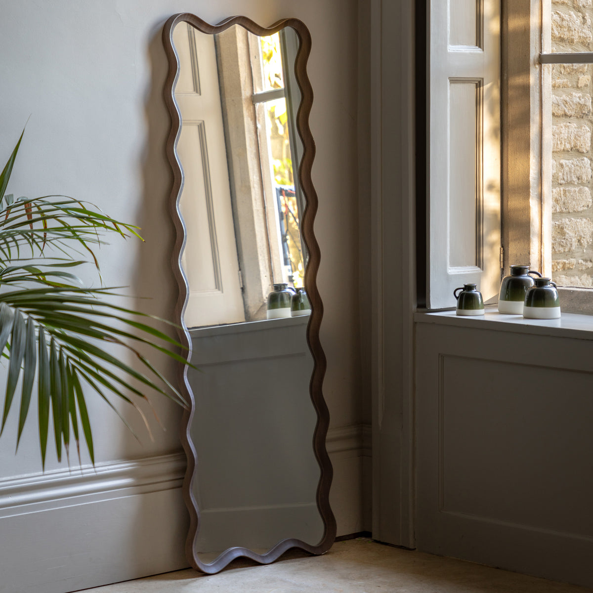 Gallery Direct Wiggle Leaner Mirror Walnut displayed in a styled interior
