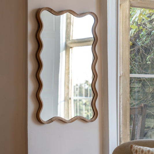 Gallery Direct Wiggle Mirror Oak displayed in a styled interior