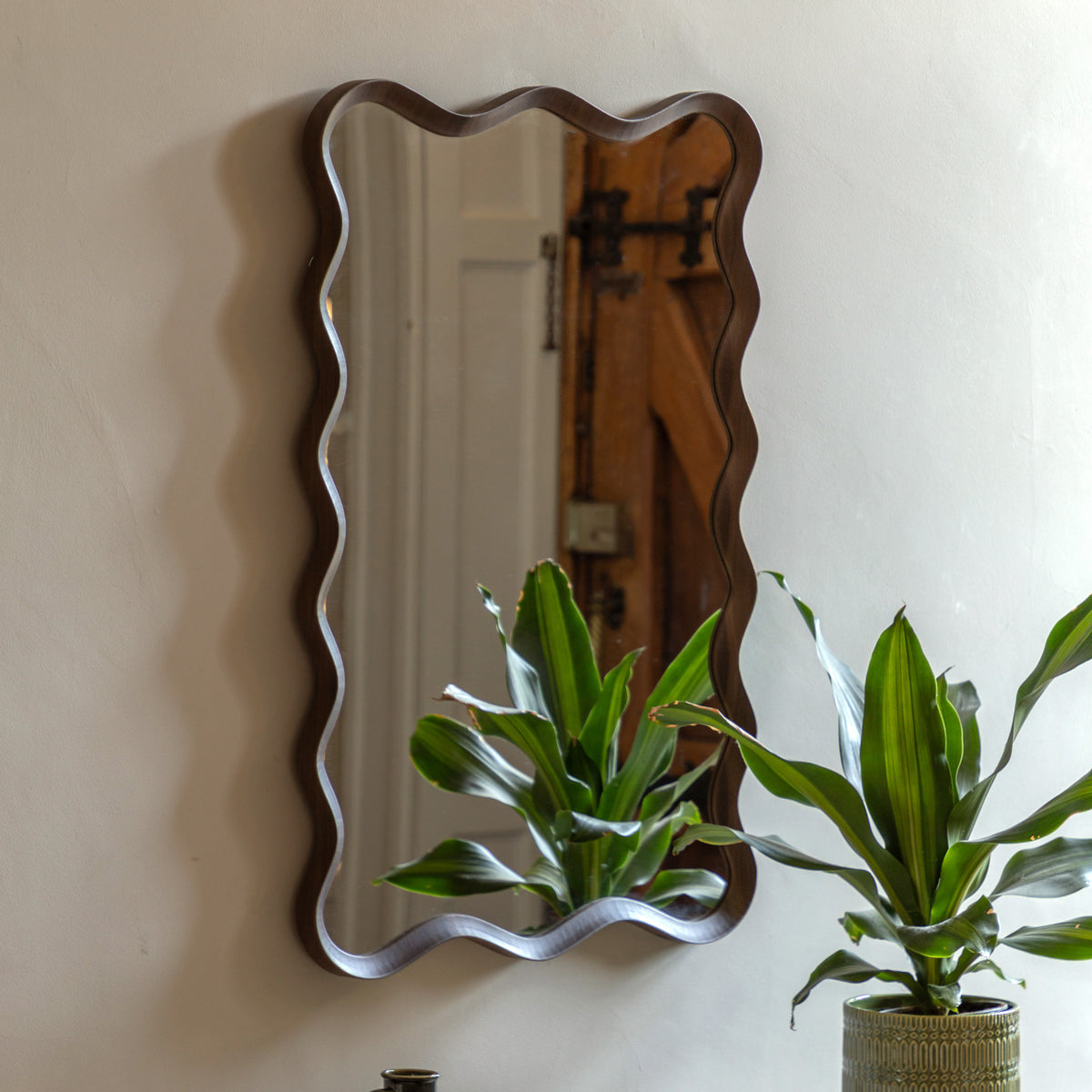 Gallery Direct Wiggle Mirror Walnut displayed in a styled interior