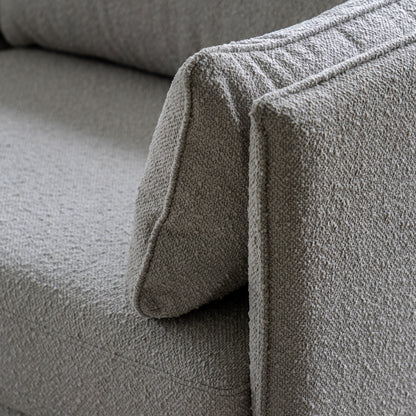 Gallery Direct Wigmore 3 Seater Sofa Upholstered in a Natural coloured boucle fabric with slim arms and matching side cushions