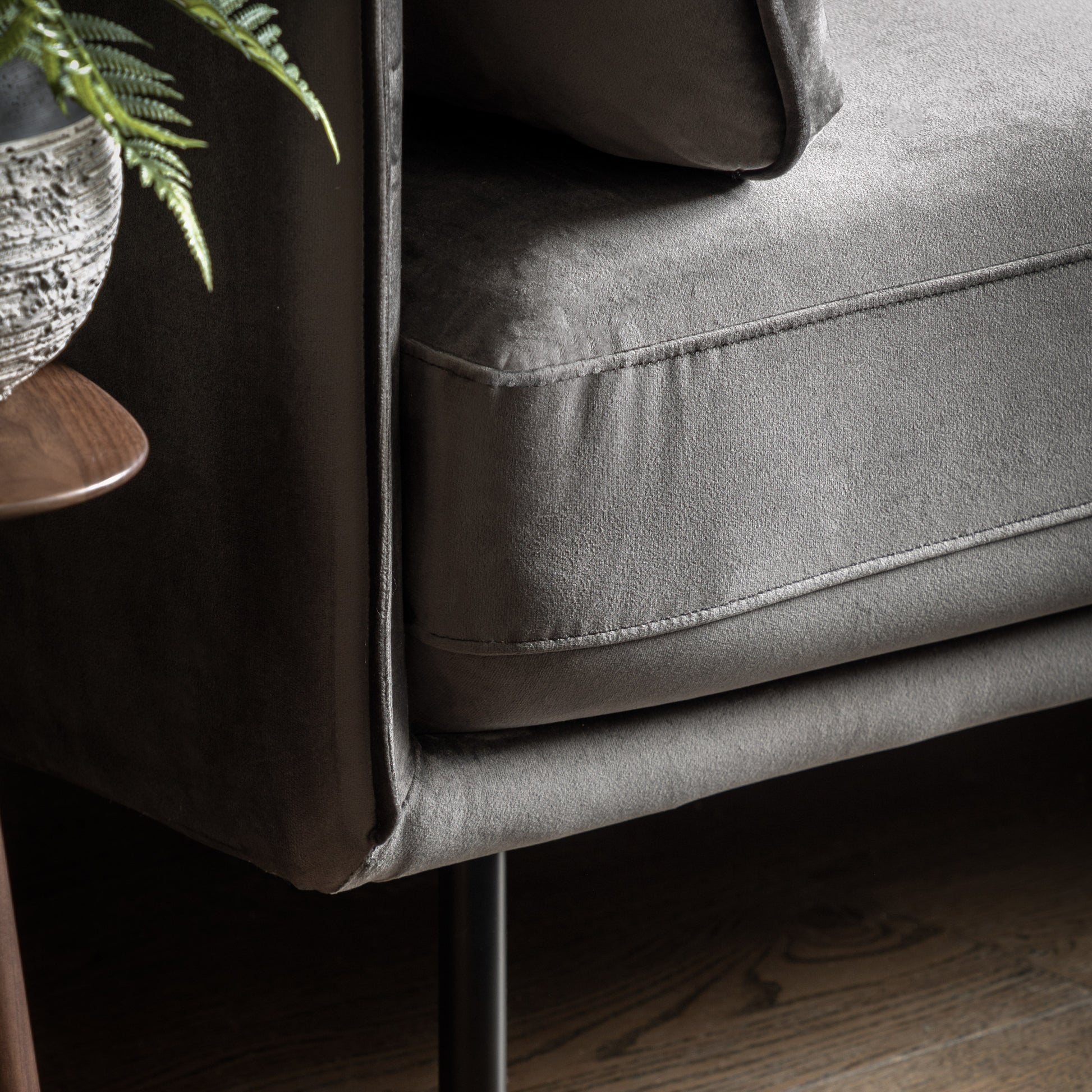 Gallery Direct Wigmore 3 Seater Sofa in Truffle velvet upholstery with stitched detailing, and black metal legs