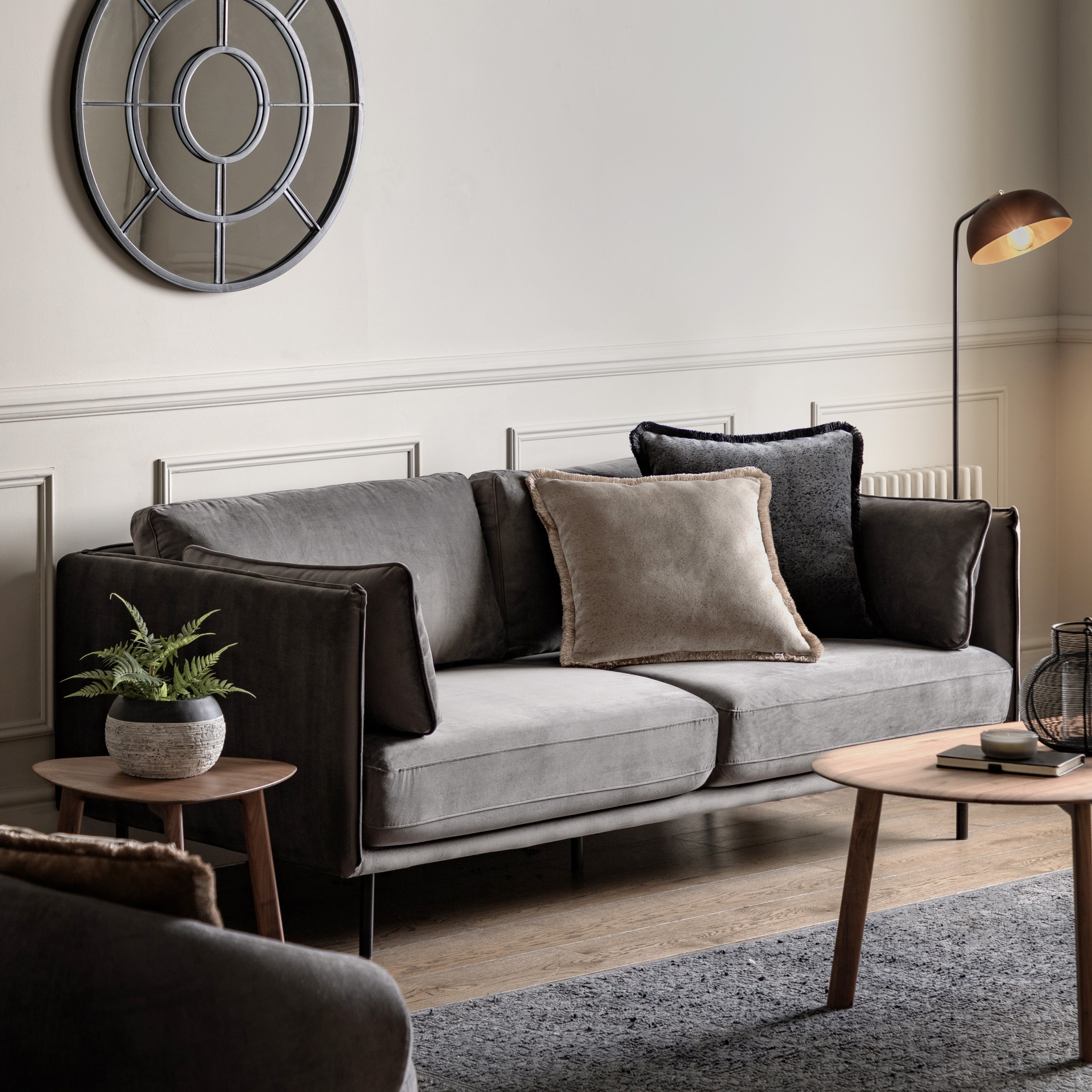 Gallery Direct Wigmore 3 Seater Sofa upholstered in a Truffle coloured velvet fabric with distinctive stitch detail and sleek black metal legs