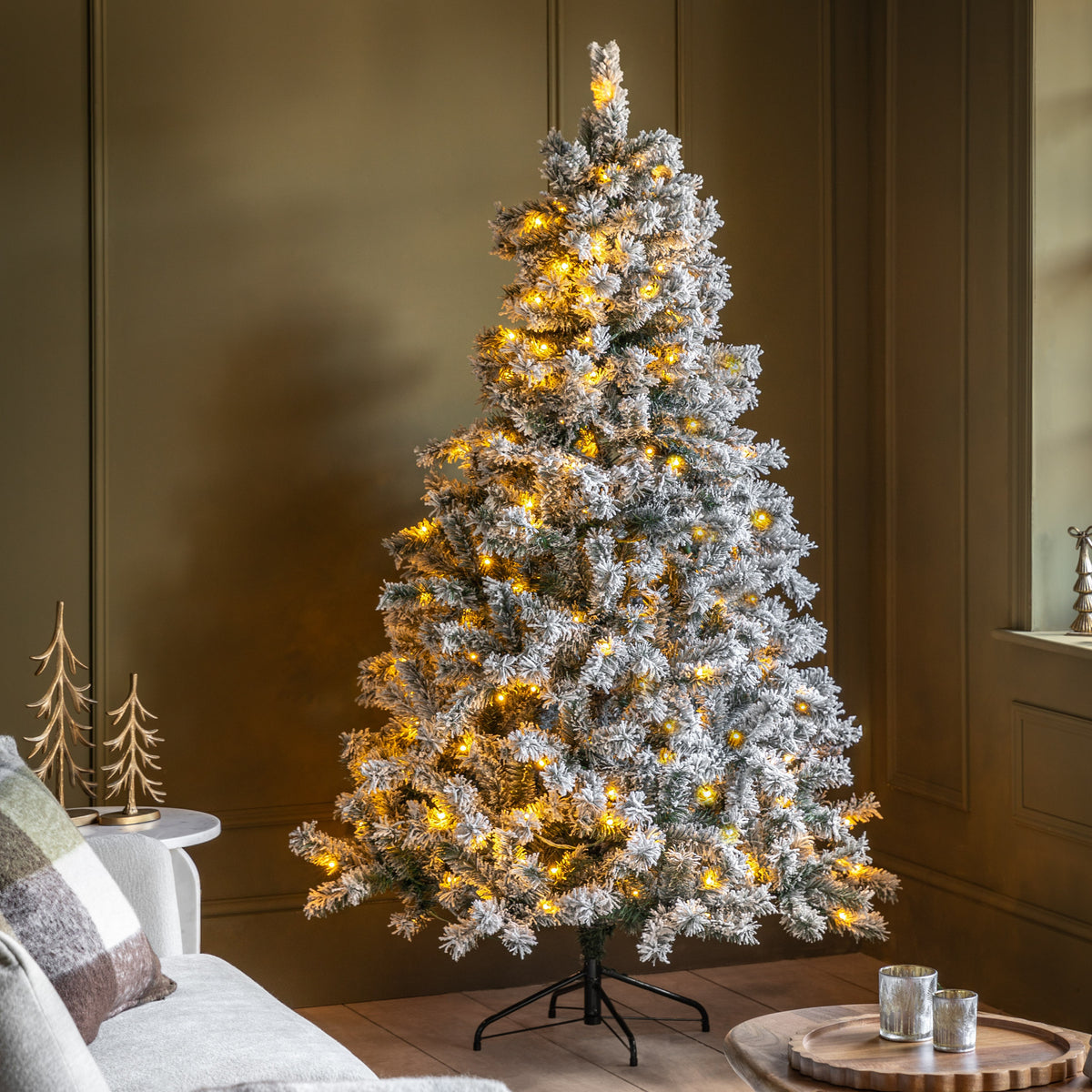 Gallery Direct Woodland Pine LED M Christmas Tree Green and White, styled in a supplier lifestyle setting