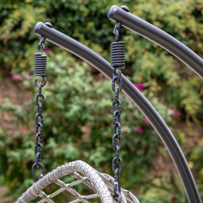 Gallery Garden Adanero Large Hanging Chair has a black powder coated steel frame and natural wickerwork basket seat for up to 2 people