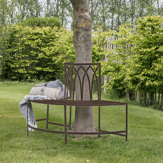 Gallery Garden Alberoni Outdoor Tree Bench Seat crafted from iron with a Distressed Brown finish