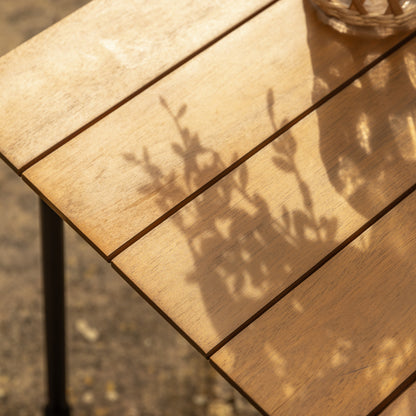 Gallery Garden Antigua 4 Piece Lounge Set includes a rectangular slatted wood table top and powder coated metal frames