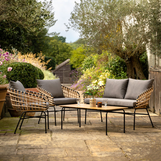 Gallery Garden Antigua Lounge Set comprises of a 2 seater sofa and 2 armchairs with a matching coffee table, made from powder coated steel frames with open woven wicker and grey padded cushions