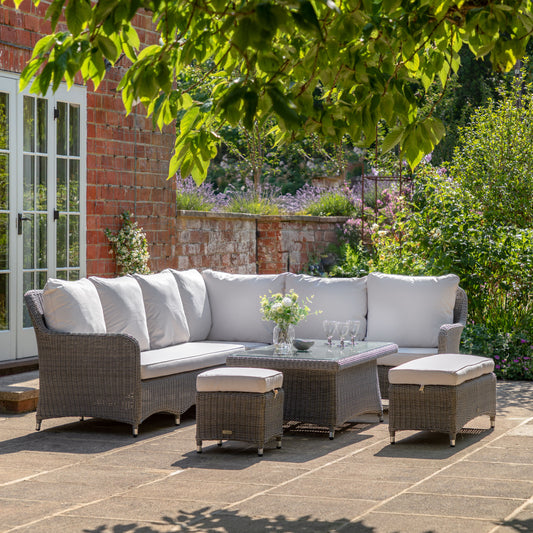 Gallery Garden Ascot Corner Dining Set can seat up to 8 people with an L-shaped sofa, 2 seater bench and a 1 seater bench/football, also including a glass top rising table