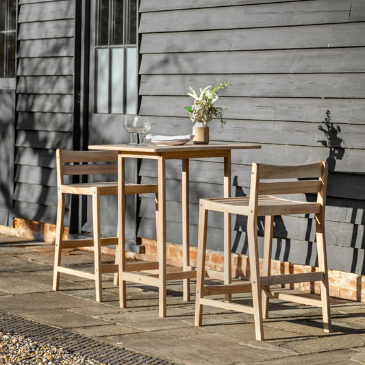 Gallery Garden Astakos High Bar Set features a high table with square slatted wood top, and 2 bar chairs with low backrest and slatted wood seat