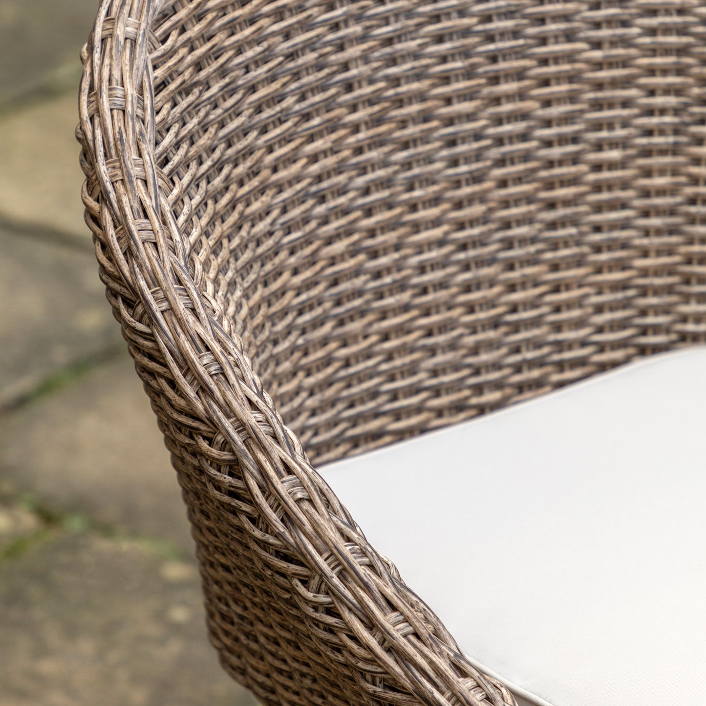 Gallery Garden Avena 4 Seater Round Dining Set includes 4 woven wicker style chairs with curved design and natural colour seat pad 
