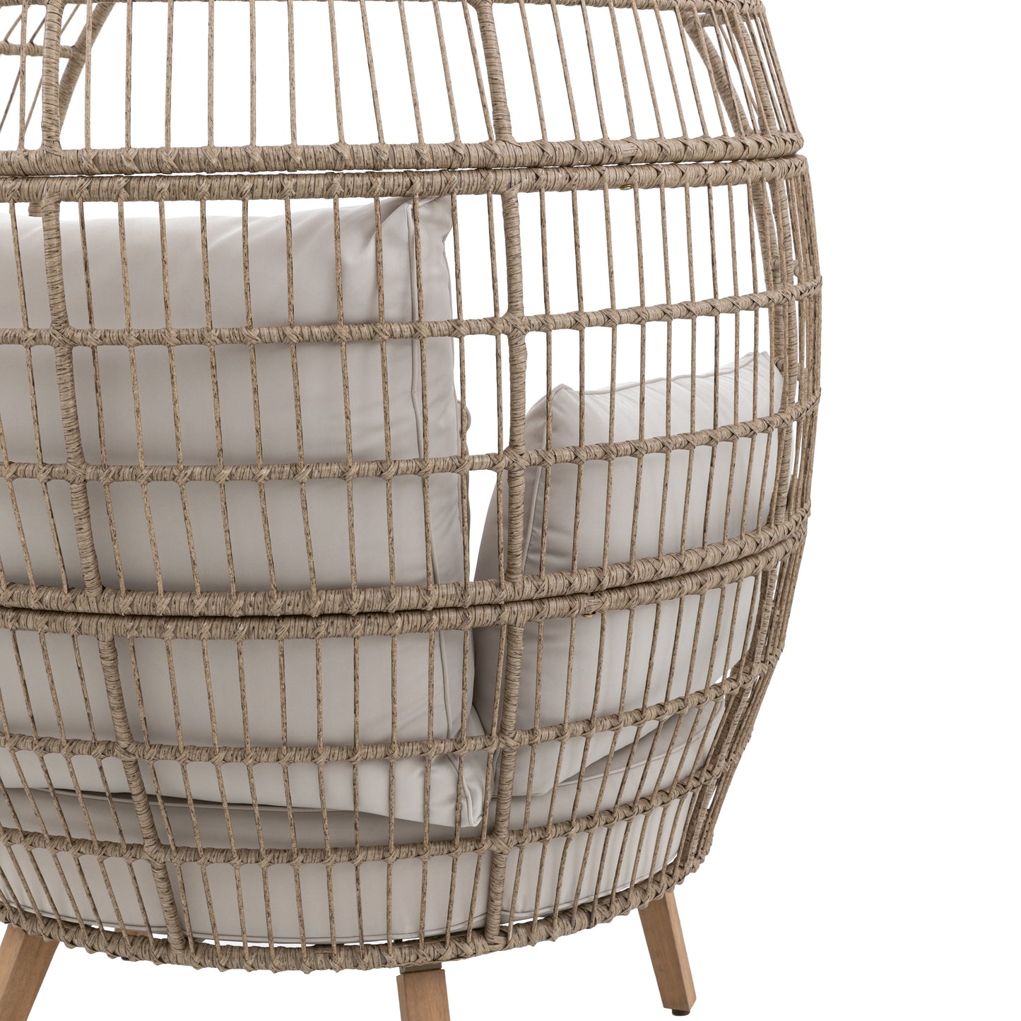 Gallery Garden Avena Egg Chair features an open wickerwork rounded frame with acacia wood legs and natural toned cushions