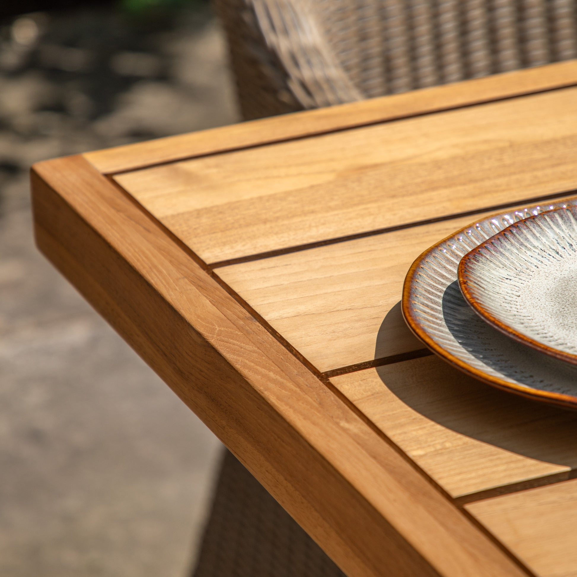 Gallery Garden Chatsworth Teak Dining Table with a grooved rectangular table top