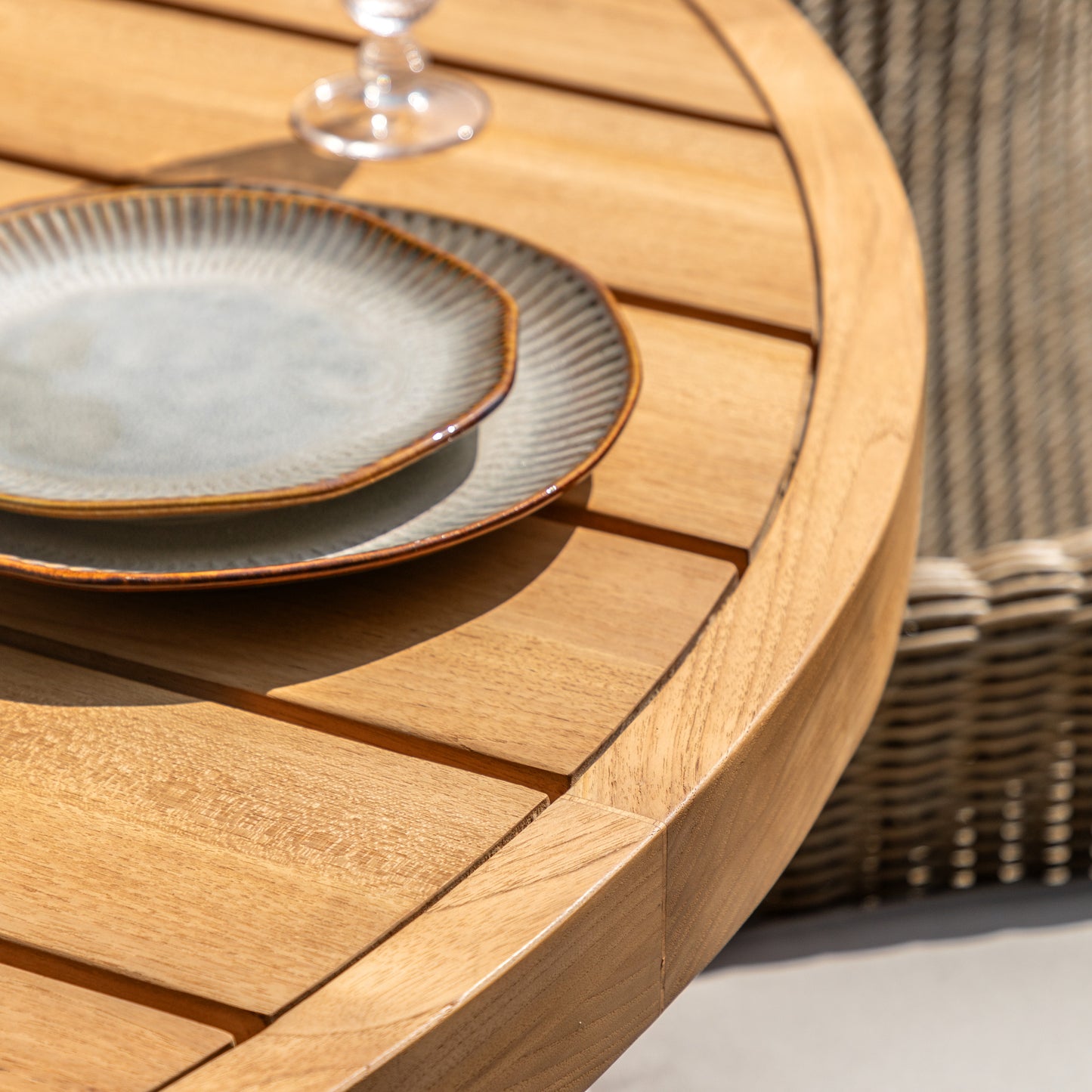 Gallery Garden Chatsworth Round Dining Table features a premium teak wood grooved table top