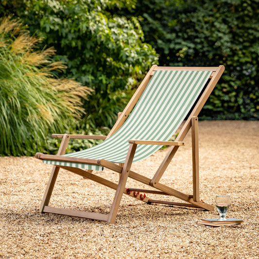 Gallery Garden Creta Folding Deck Chair with a Green and White Striped seat fabric within the premium acacia wood frame