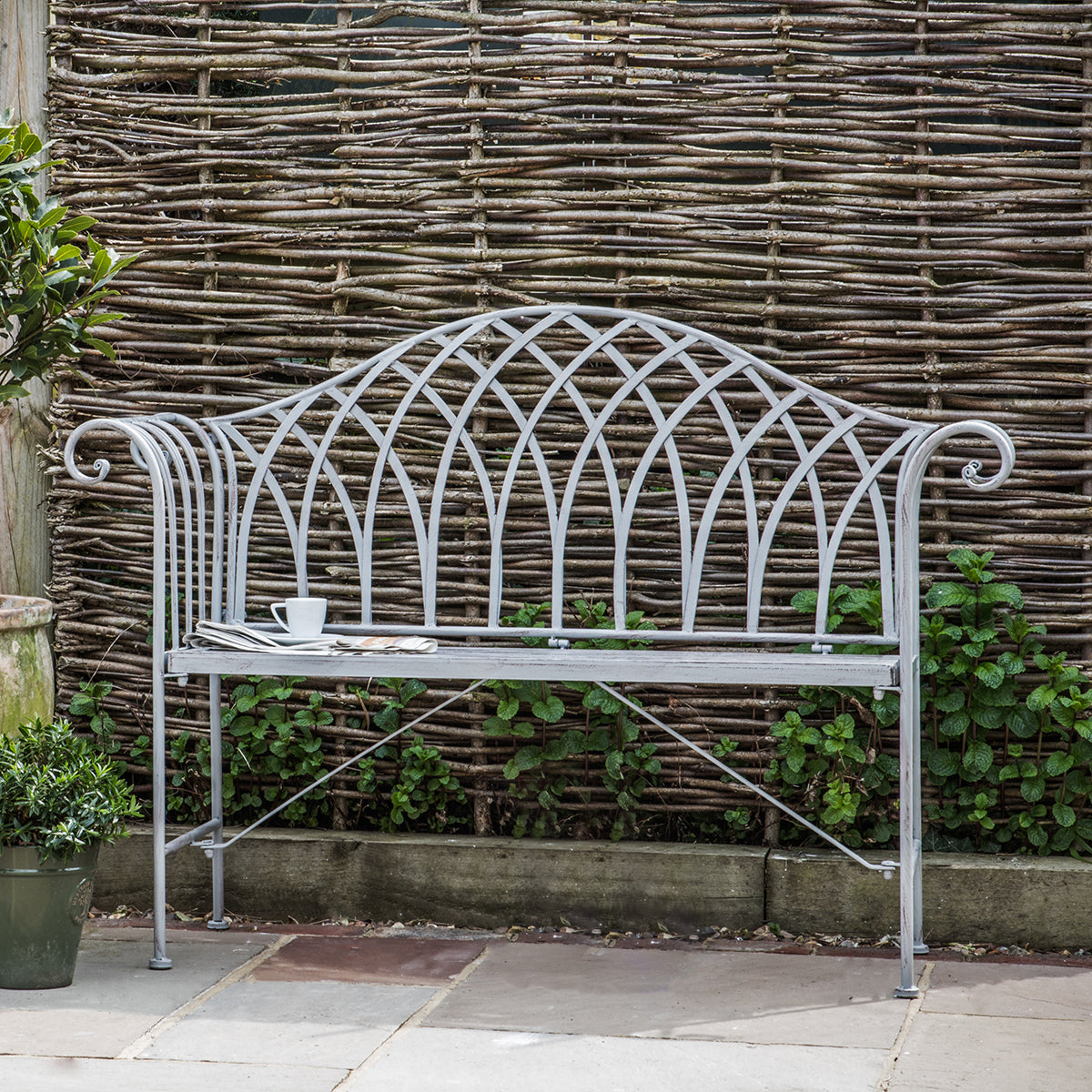 Gallery Garden Duchess Metal Bench Painted in a Distressed Grey colour with scroll-style arms and a curved back design