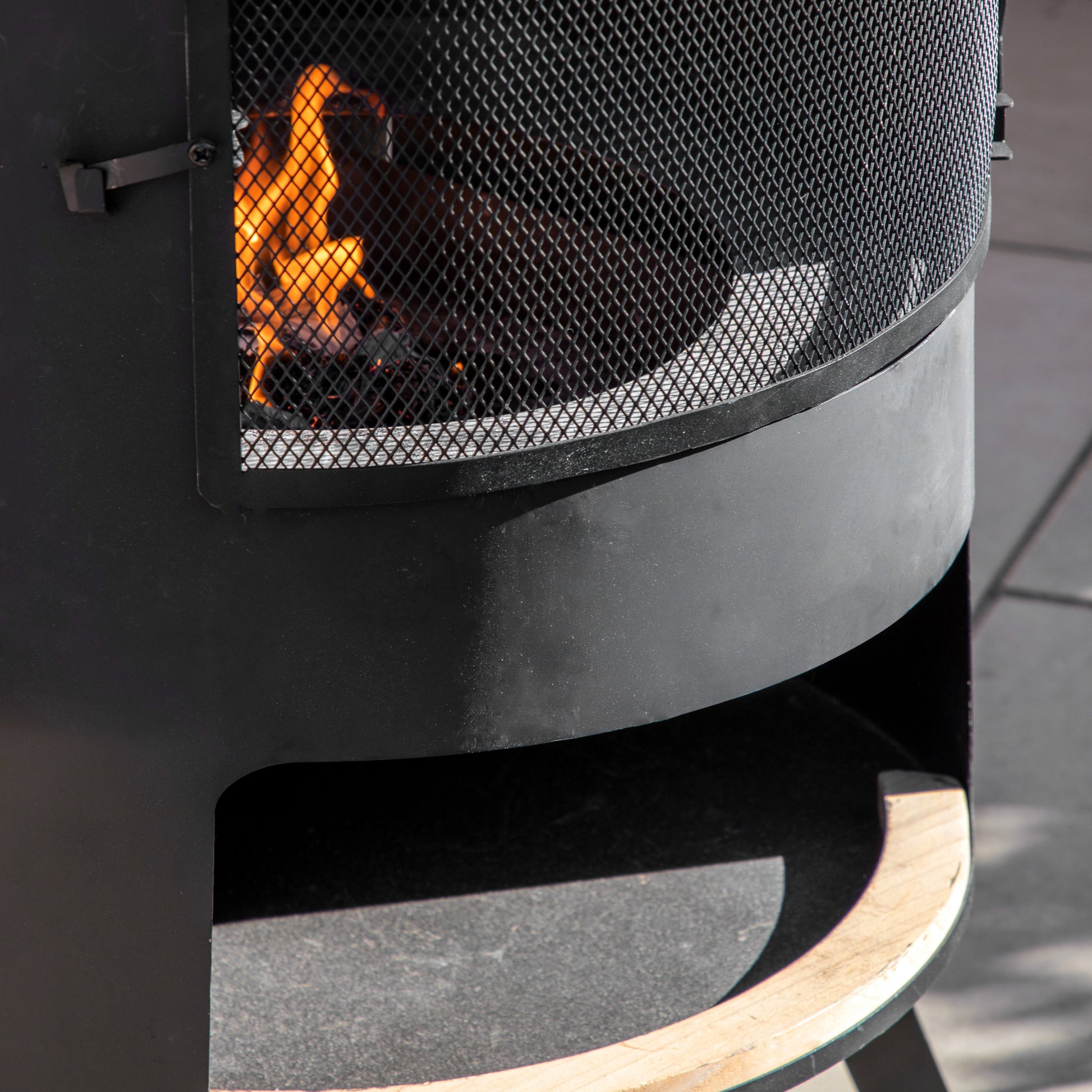 Gallery Garden Foligno Chiminea with Pizza Shelf and fire chamber, with an elevated flue in black metal and mesh front