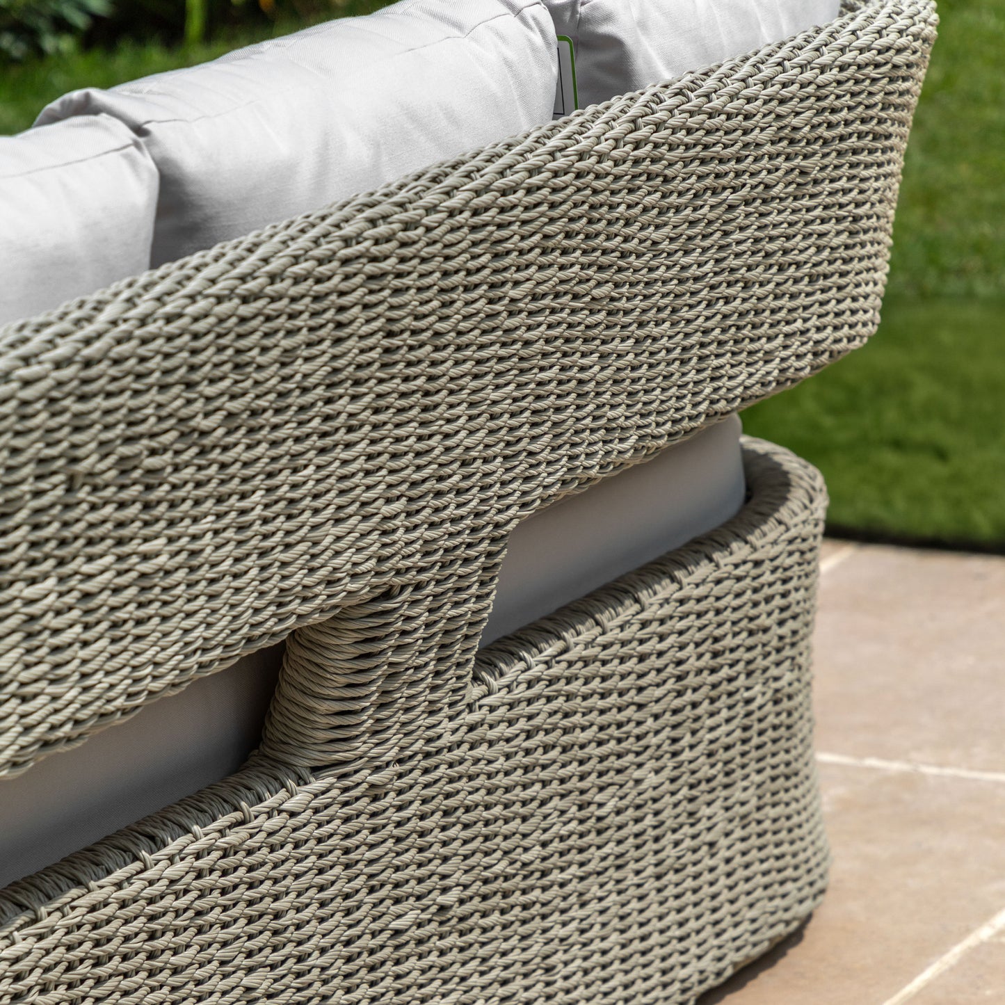 Gallery Garden Hvar 3 Seater Sofa has a grey toned wicker frame with cut-out back detail, and padded seat cushions
