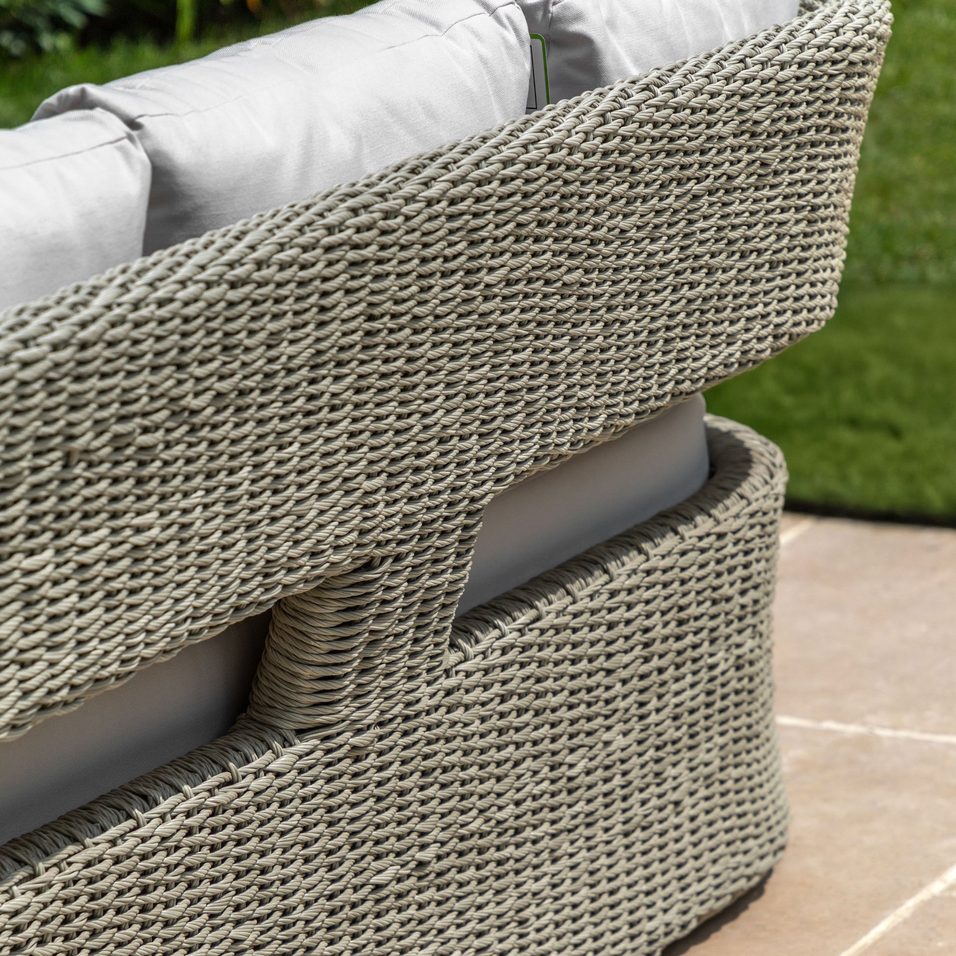 Gallery Garden Hvar 3 Seater Sofa has a grey toned wicker frame with cut-out back detail, and padded seat cushions