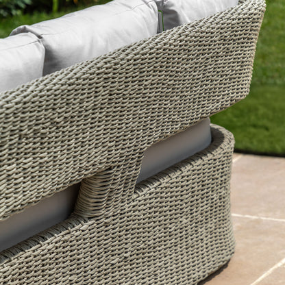 Gallery Garden Hvar 3 Seater Sofa has a grey toned wicker frame with cut-out back detail, and padded seat cushions