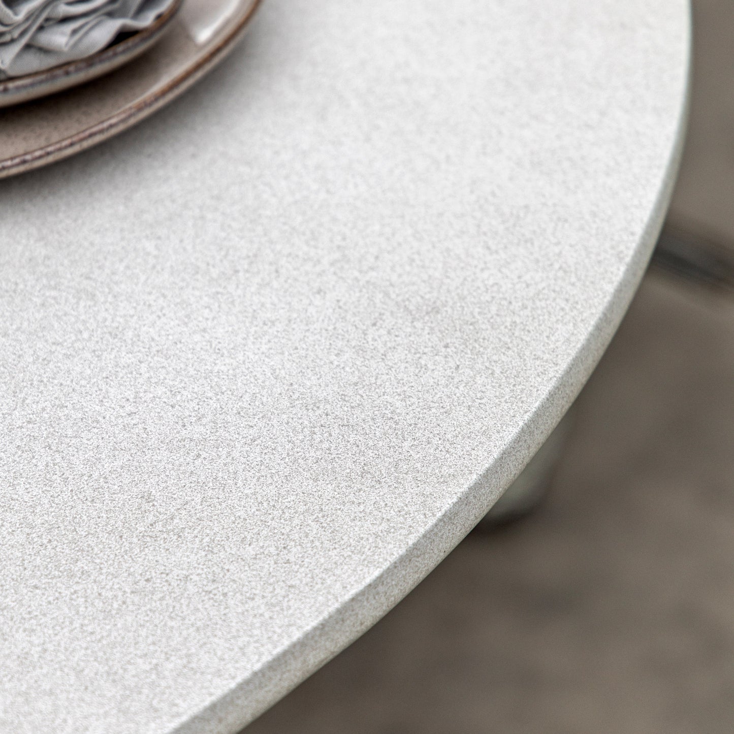 Gallery Garden Hvar Round Dining Table for 4 people is constructed from glass reinforced concrete with a softly textured finish