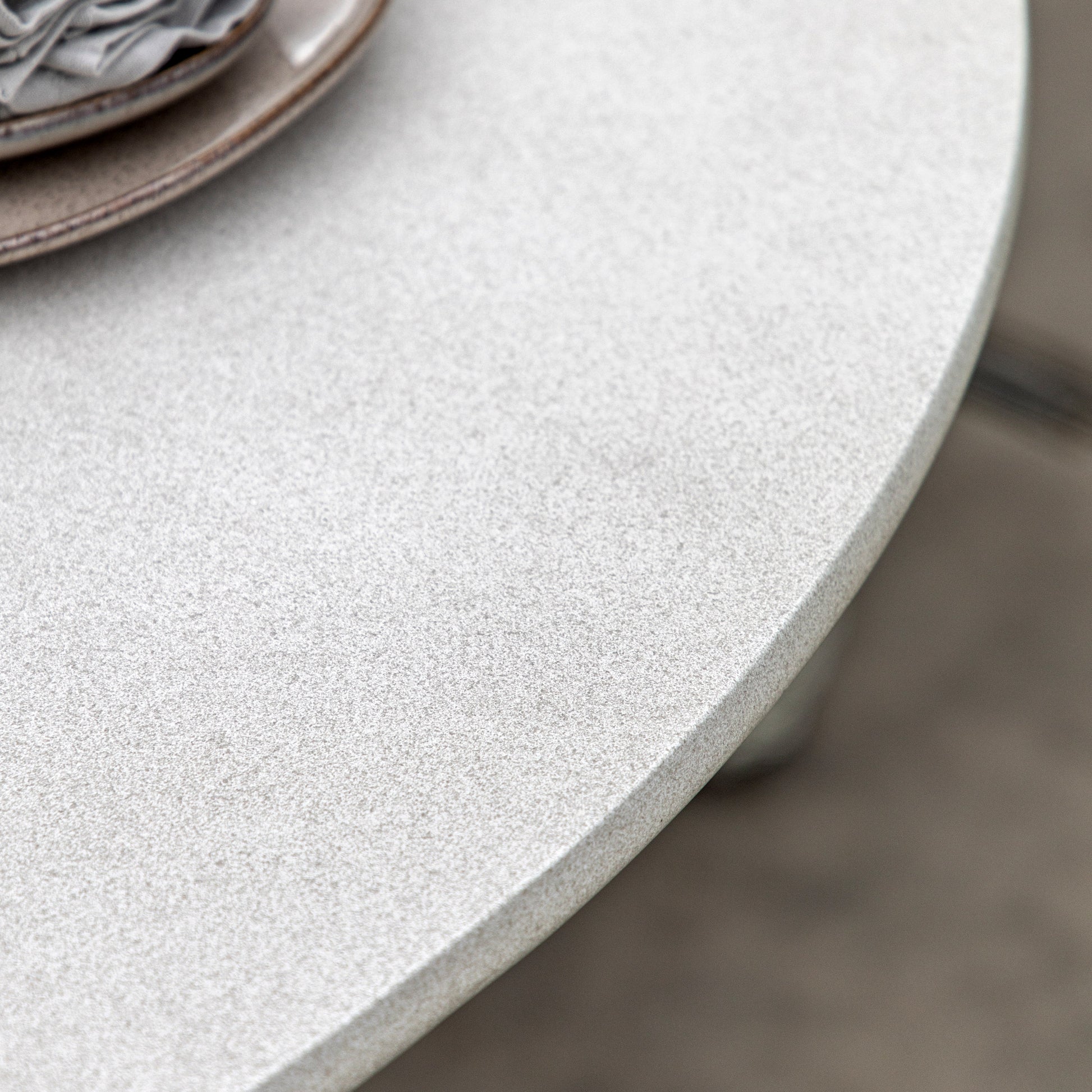 Gallery Garden Hvar Round Dining Table for 4 people is constructed from glass reinforced concrete with a softly textured finish