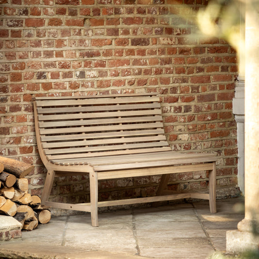 Gallery Garden Kalamata 2 Seater Outdoor Bench, crafted from natural acacia wood with a gently curved, slatted wood design