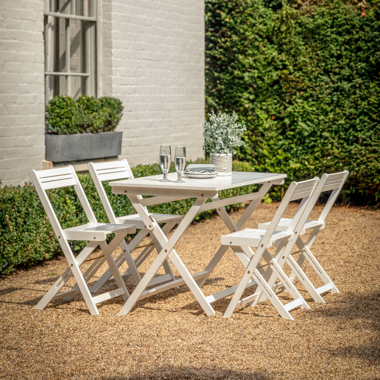 Gallery Garden Lindos Foldaway Dining Set in White painted acacia wood, with 4 chairs and a slatted table 