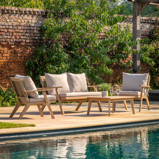 Gallery Garden Marina Lounge Set is constructed from a natural acacia wood with rope woven seat backs and plush grey cushions, plus a matching coffee table