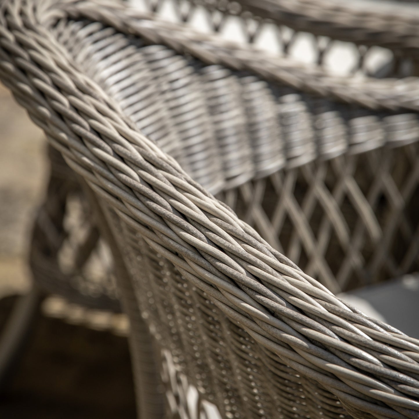 Gallery Garden Menton 6 Seater Round Dining Set constructed using a stone coloured PE woven rattan