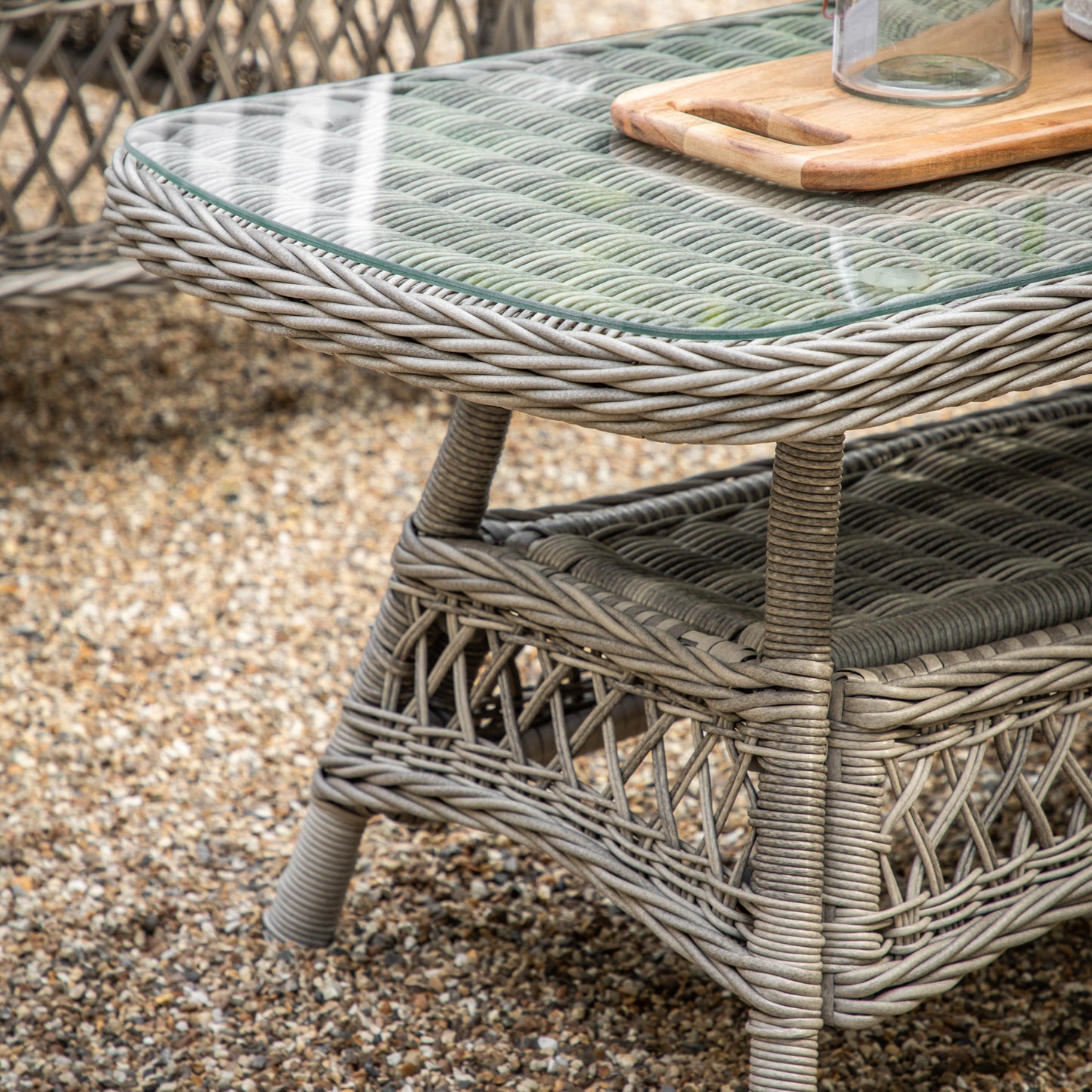 Gallery Garden Menton Chaise Set in Stone coloured PE rattan includes a glass topped coffee table with lower shelf and a chaise 3 seater sofa