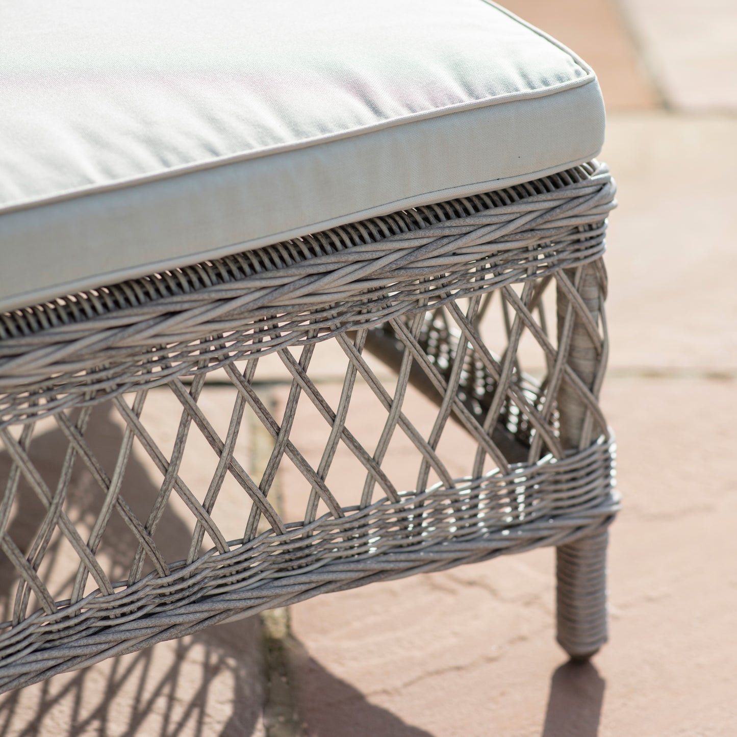 Gallery Garden Menton Country Sun Lounger in Stone colour PE wicker with natural coloured plush cushions
