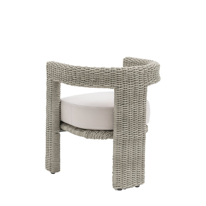 Gallery Garden Pair of Hvar Dining Chairs feature a curved wicker frame with tripod style legs and a generously padded seat cushion