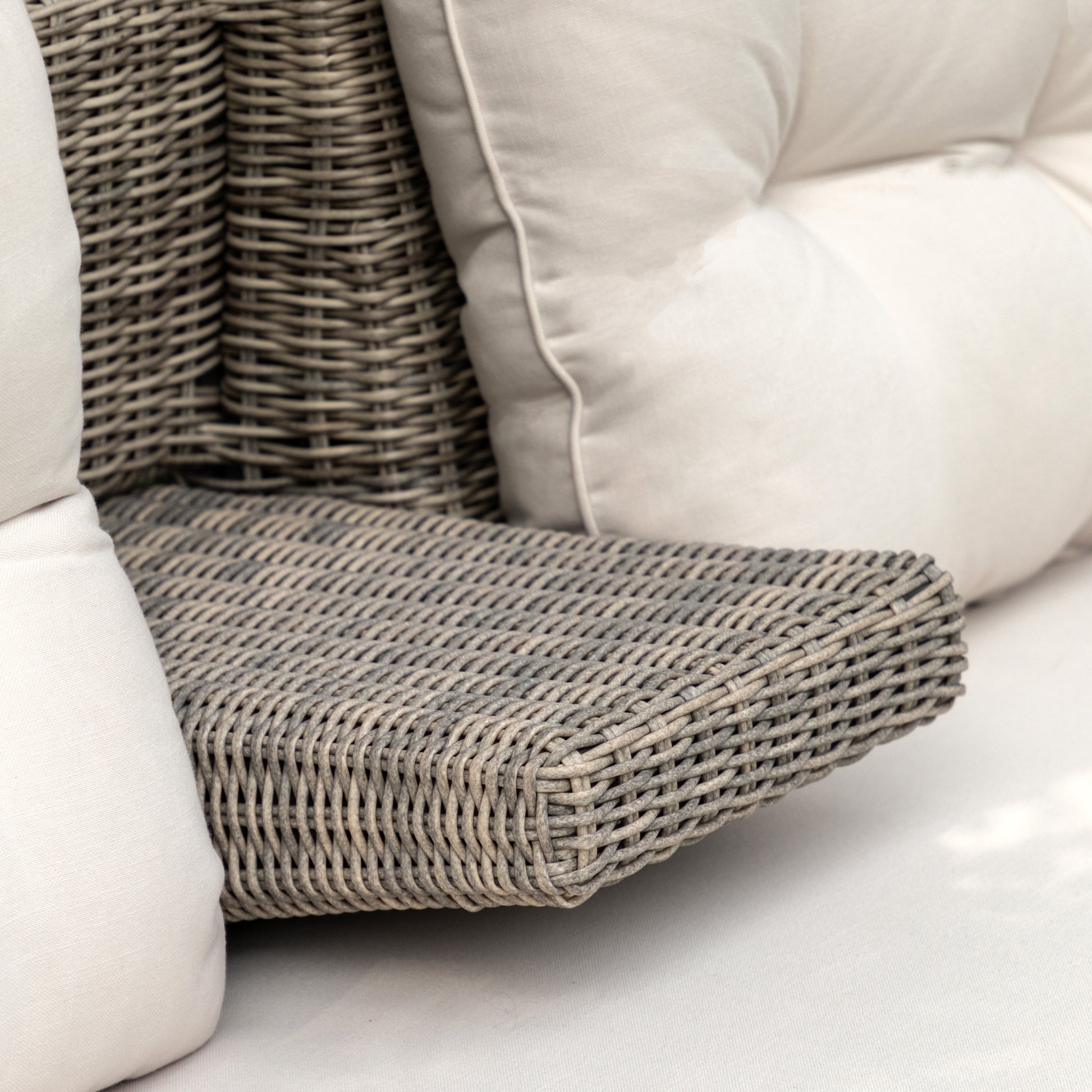 Gallery Garden Porto Storage Sofa 2 Seater with a pull down central armrest, constructed from durable PE wicker with sumptuous seat cushions