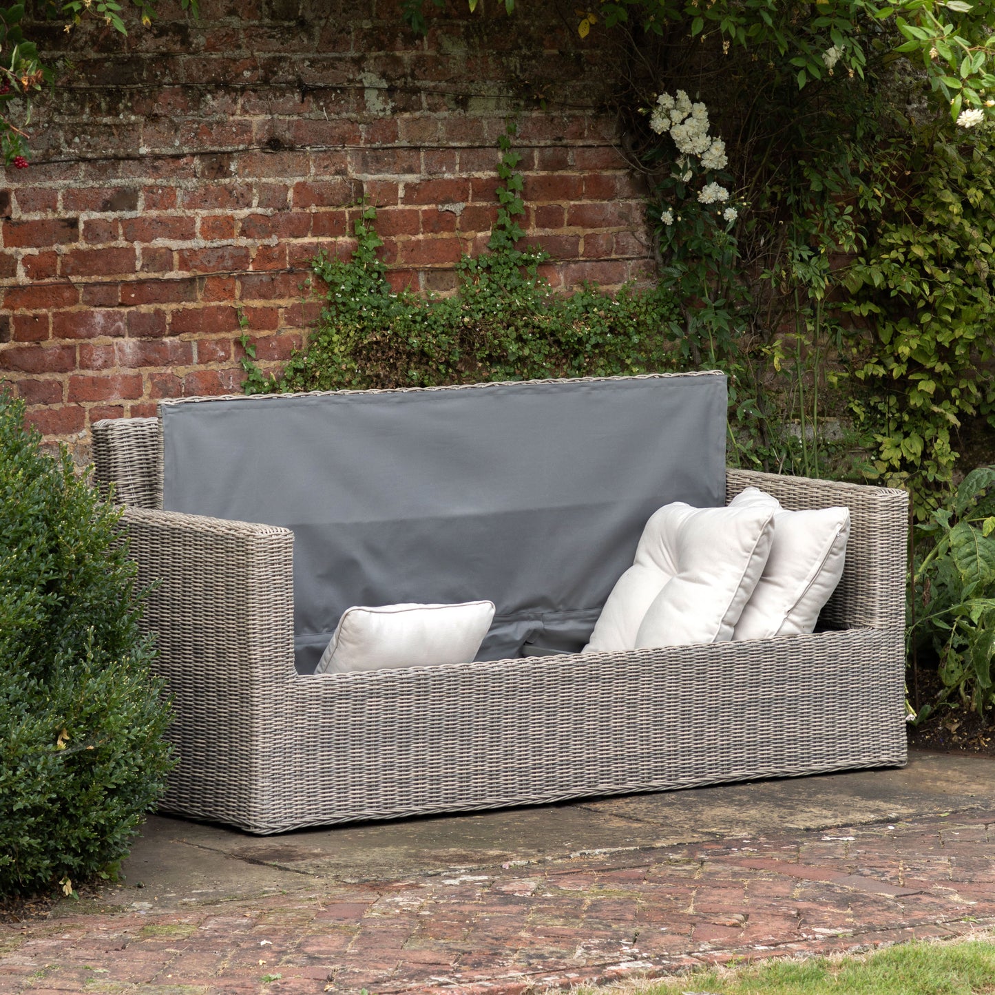 Gallery Garden Porto Storage Sofa with a lift up seat and storage compartment, constructed from a premium PE wicker