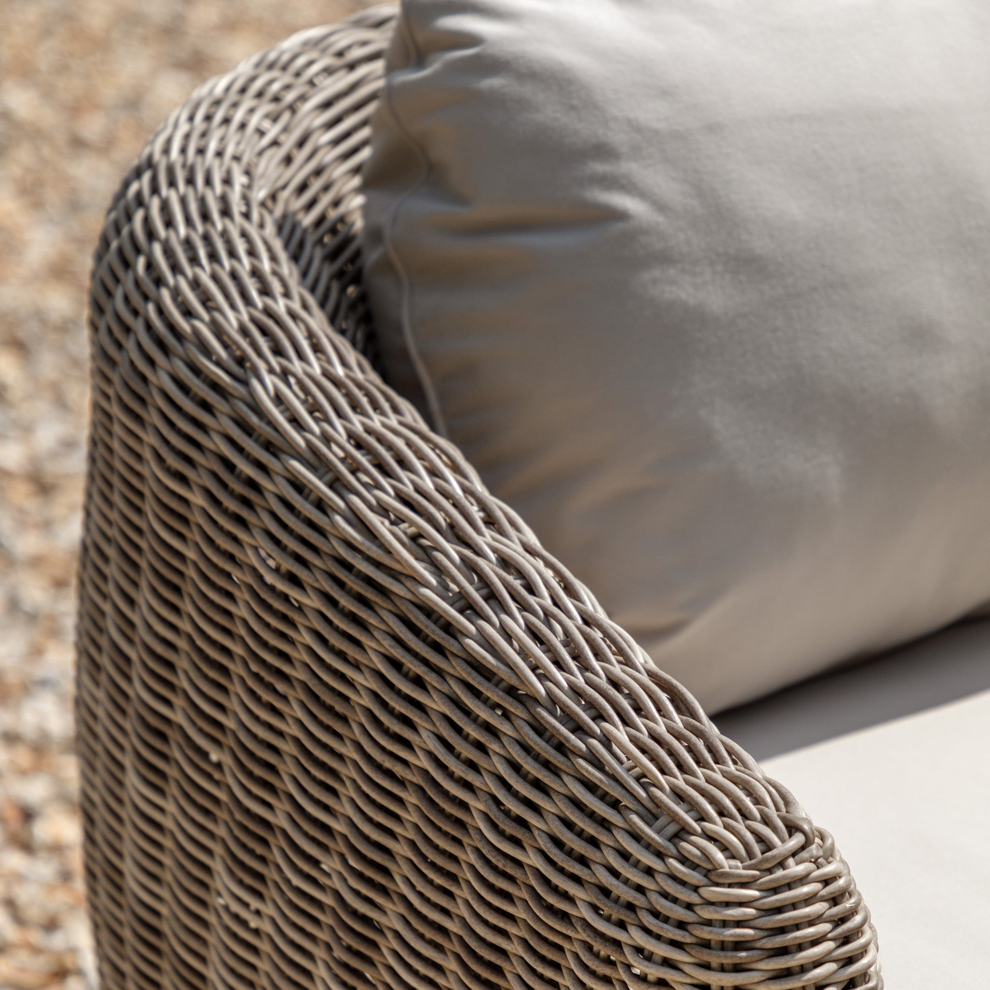 Gallery Garden Positano 2 Seater Sofa made from weather resistant woven plastic wicker, with natural coloured padded seat cushions