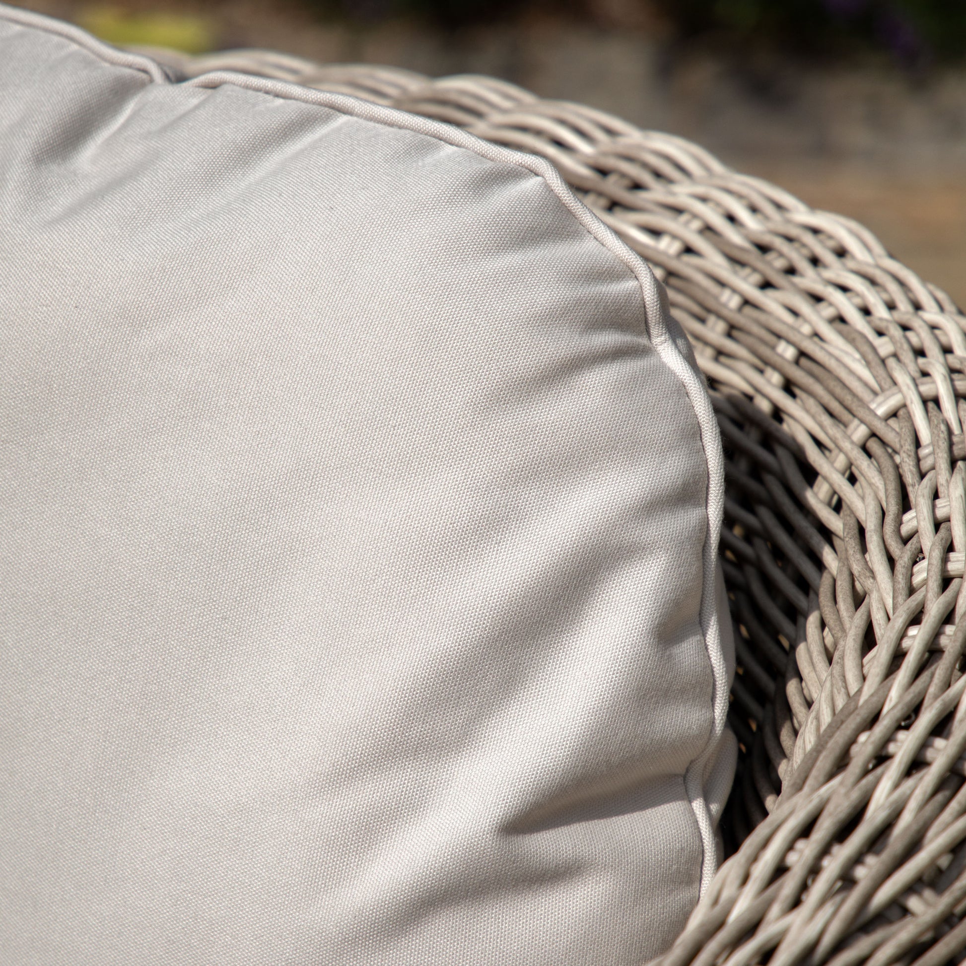 Gallery Garden Positano Armchair is constructed from a woven plastic wicker, with generously padded cushions in a natural colour