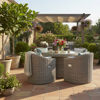 The Gallery Garden Ragusa 4 Seater Dining Set features four poly rattan weave chairs with premium thick cushions and a matching glass topped round dining table 