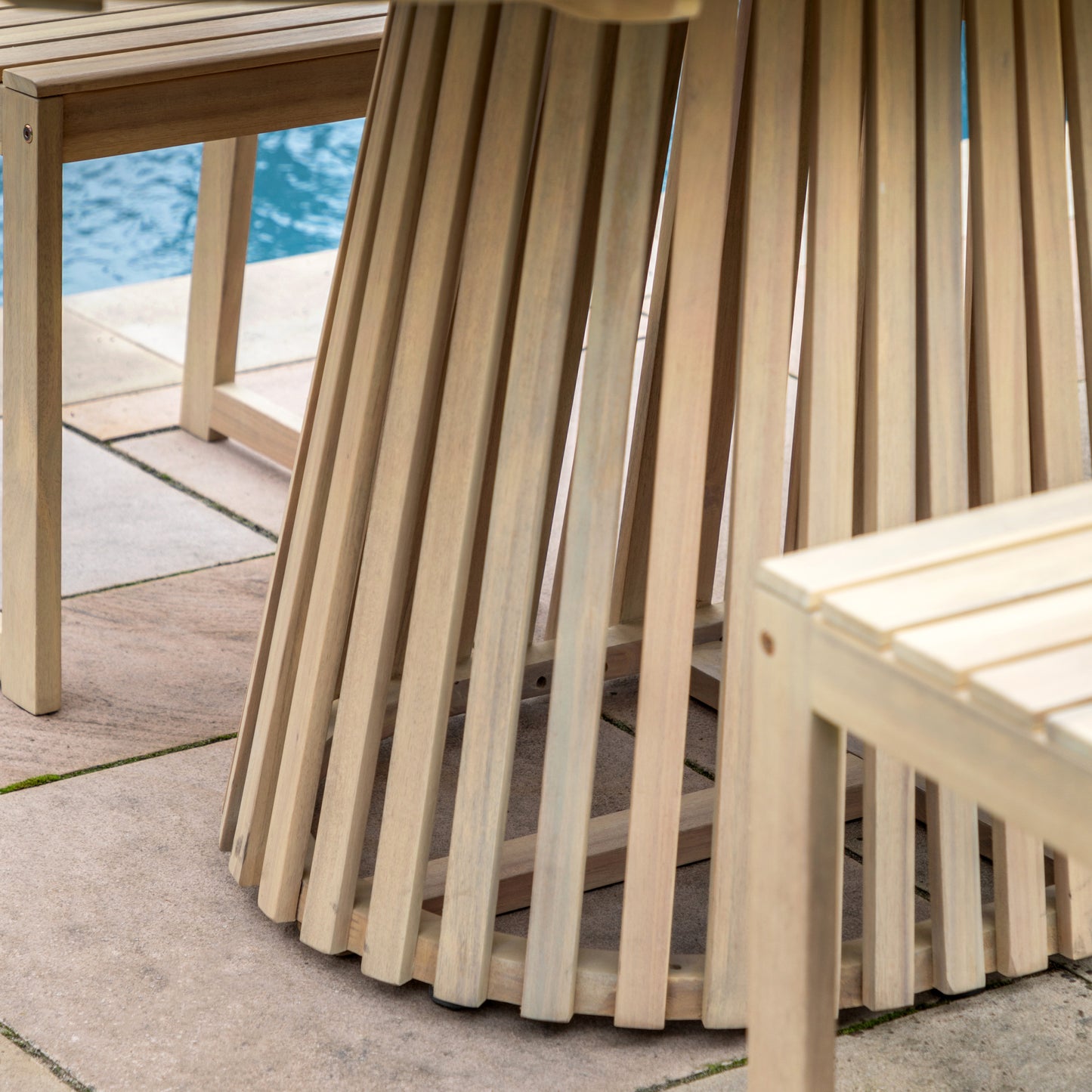 Gallery Garden Rialto Oval Dining Table features a slatted acacia wood base 