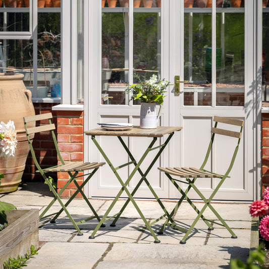 Gallery Garden Ronda Bistro Set features a small table and 2 chairs constructed from foldable steel frames in green, and acacia wood slatted seat and table top