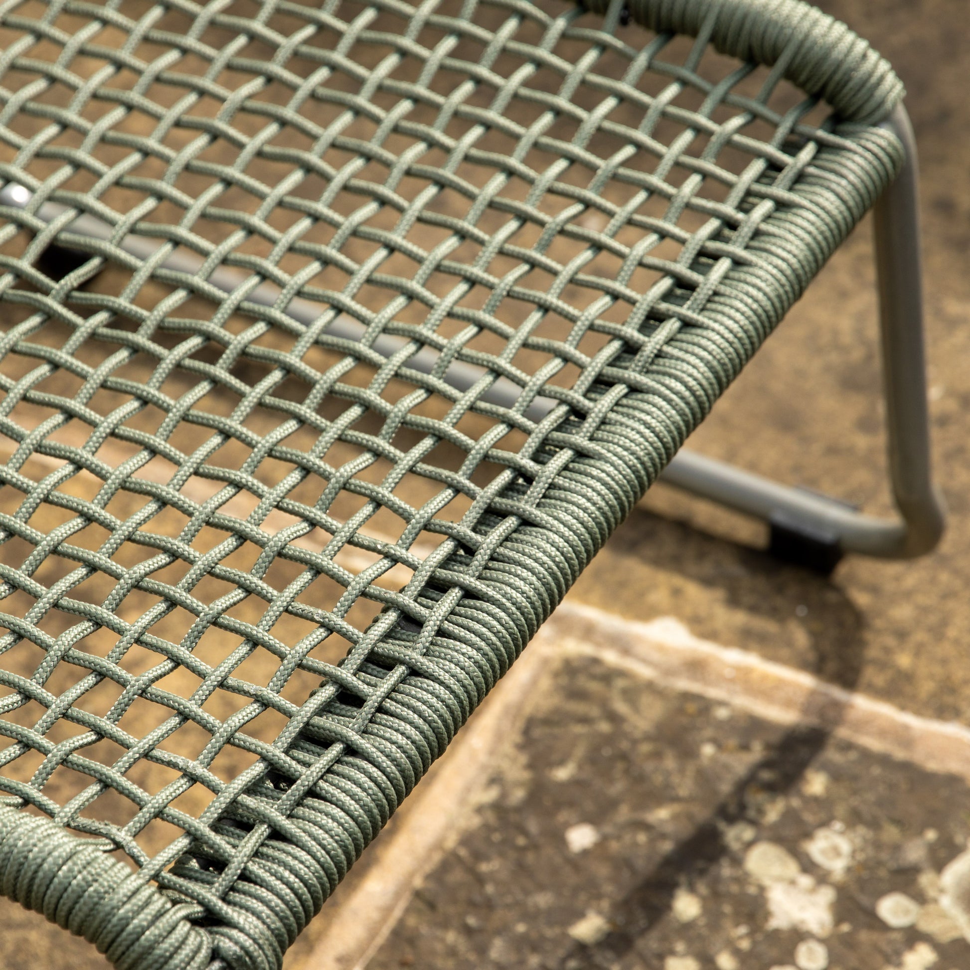 Gallery Garden Sassano Green Lounge Chair and Footstool with a steel frame and woven rope seat and backrest