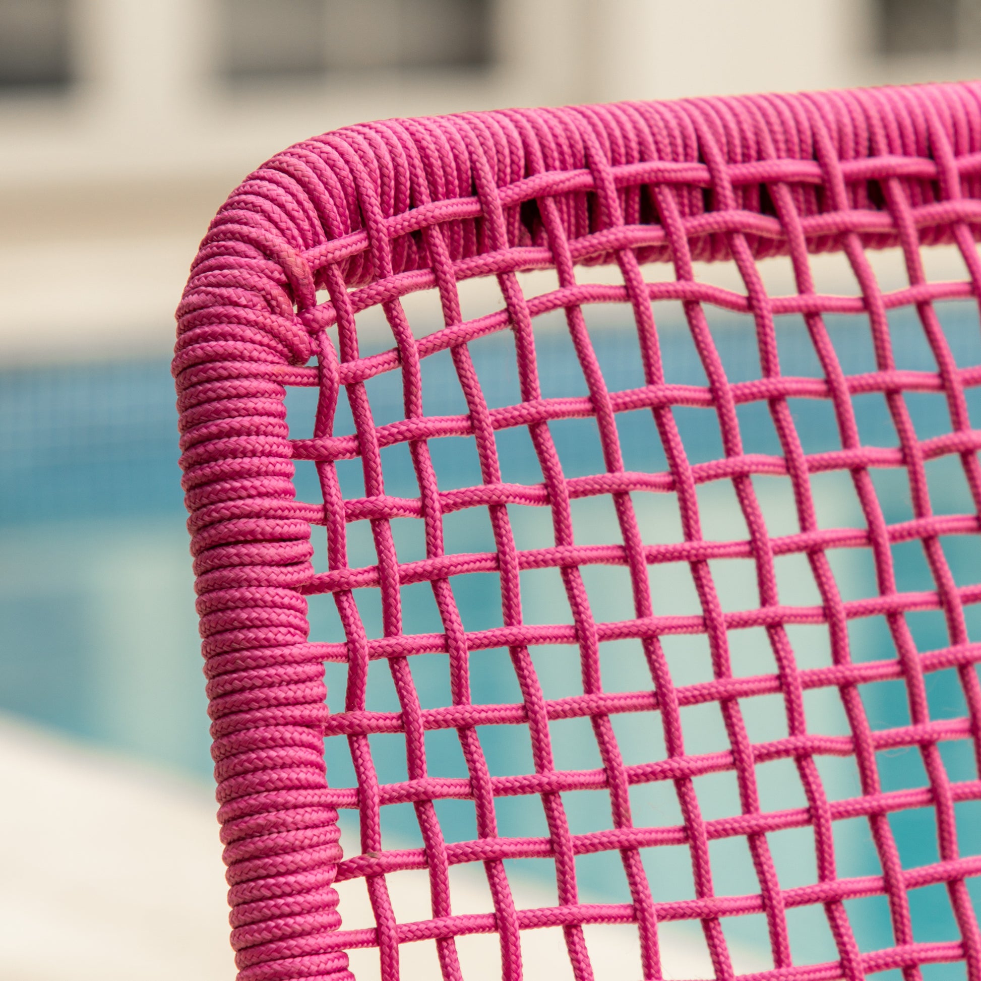Gallery Garden Sassano Lounge Chair with Footstool features a steel frame and rope woven seat and back rest in a striking Pink colour