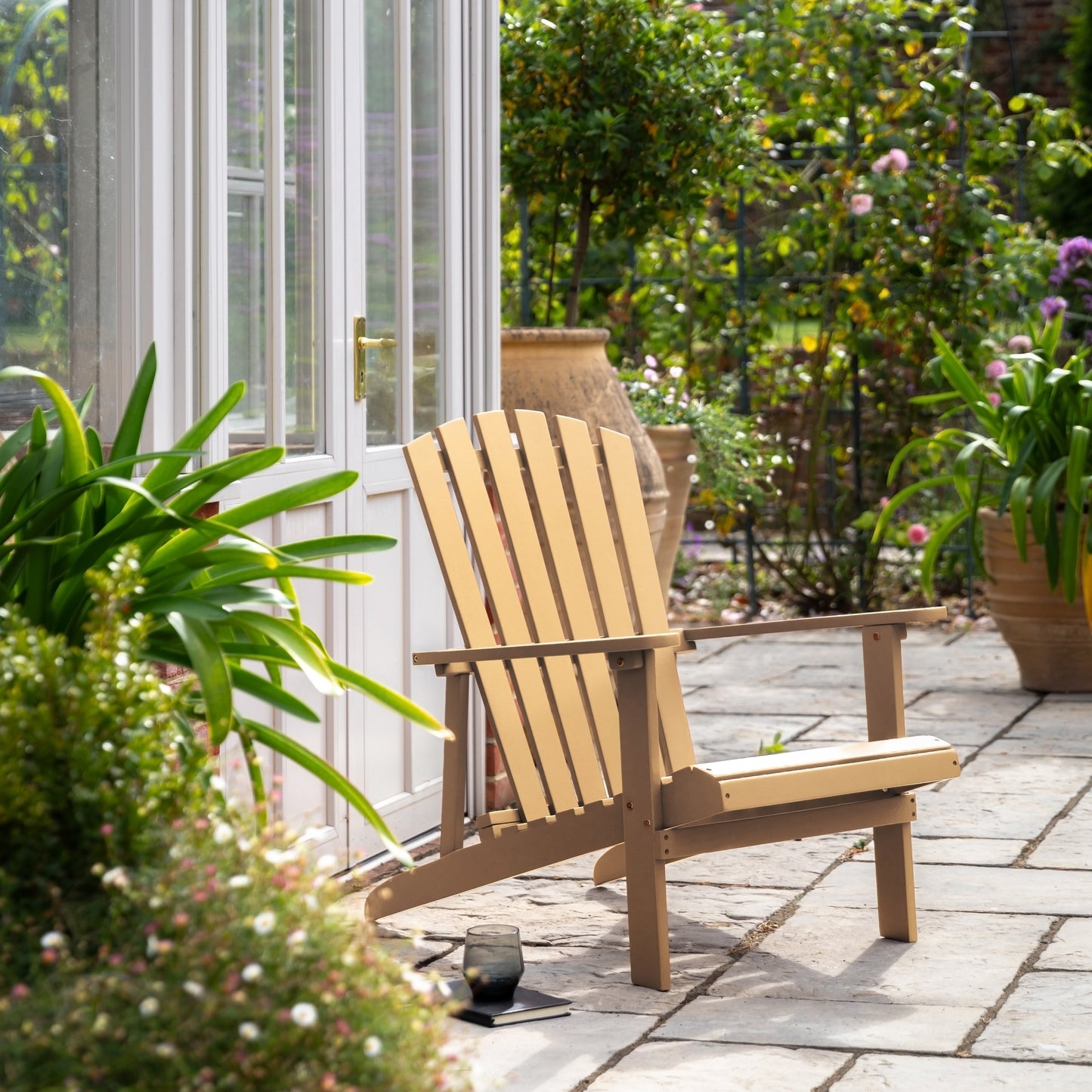 The Gallery Garden Siena Lounge Chair is crafter in an Adirondack style in a contemporary Pastry yellow colour palette, with slatted acacia wood seat and back rest