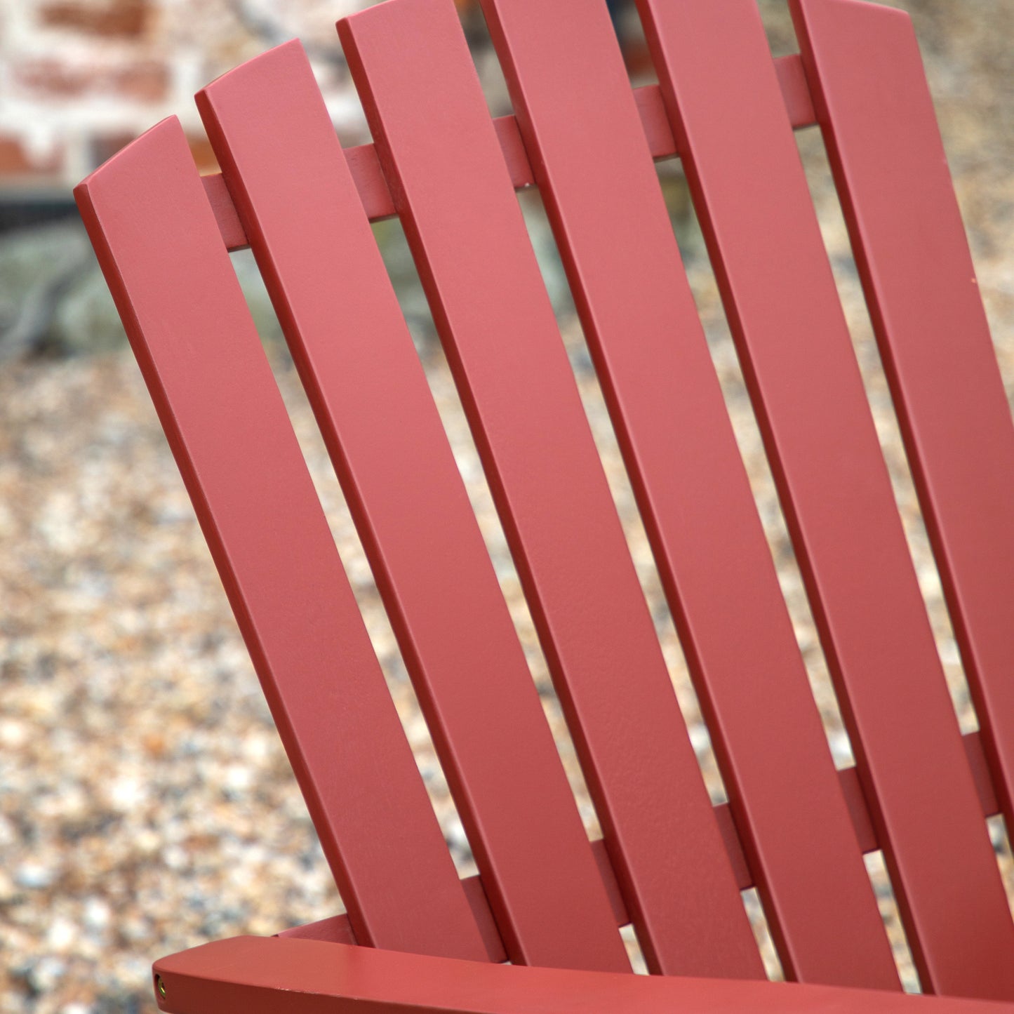 Gallery Garden Siena Adirondack Lounge Chair in Rust colour has a slatted seat and backrest